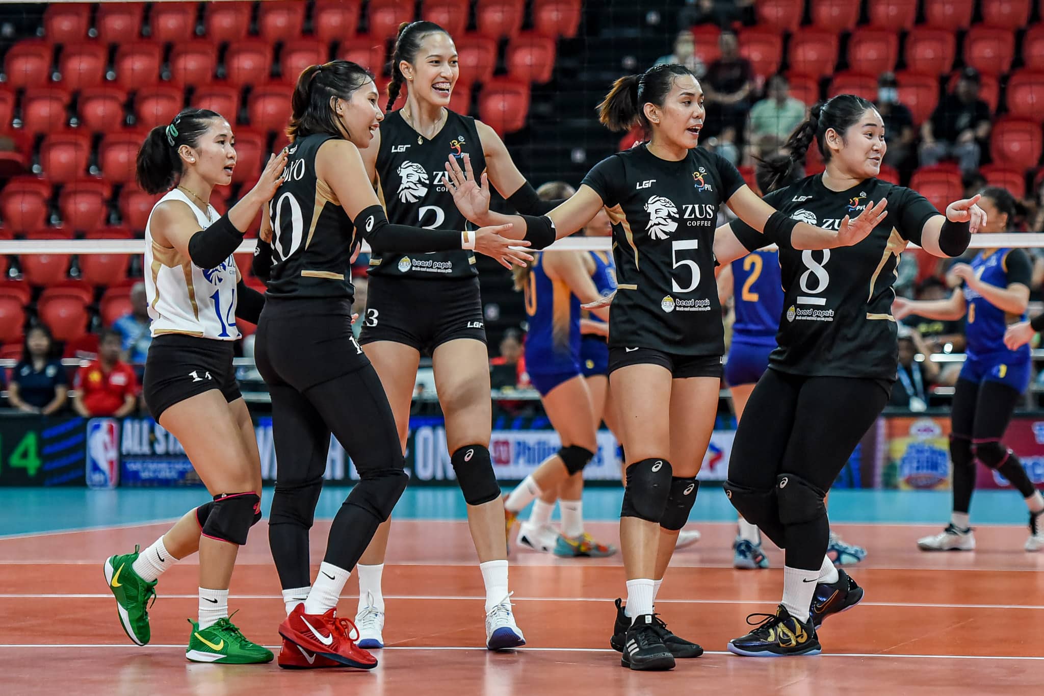 ZUS Coffee Thunderbelles celebrate a point against Capital1 Solar Spikers in the PVL All-Filipino Conference.