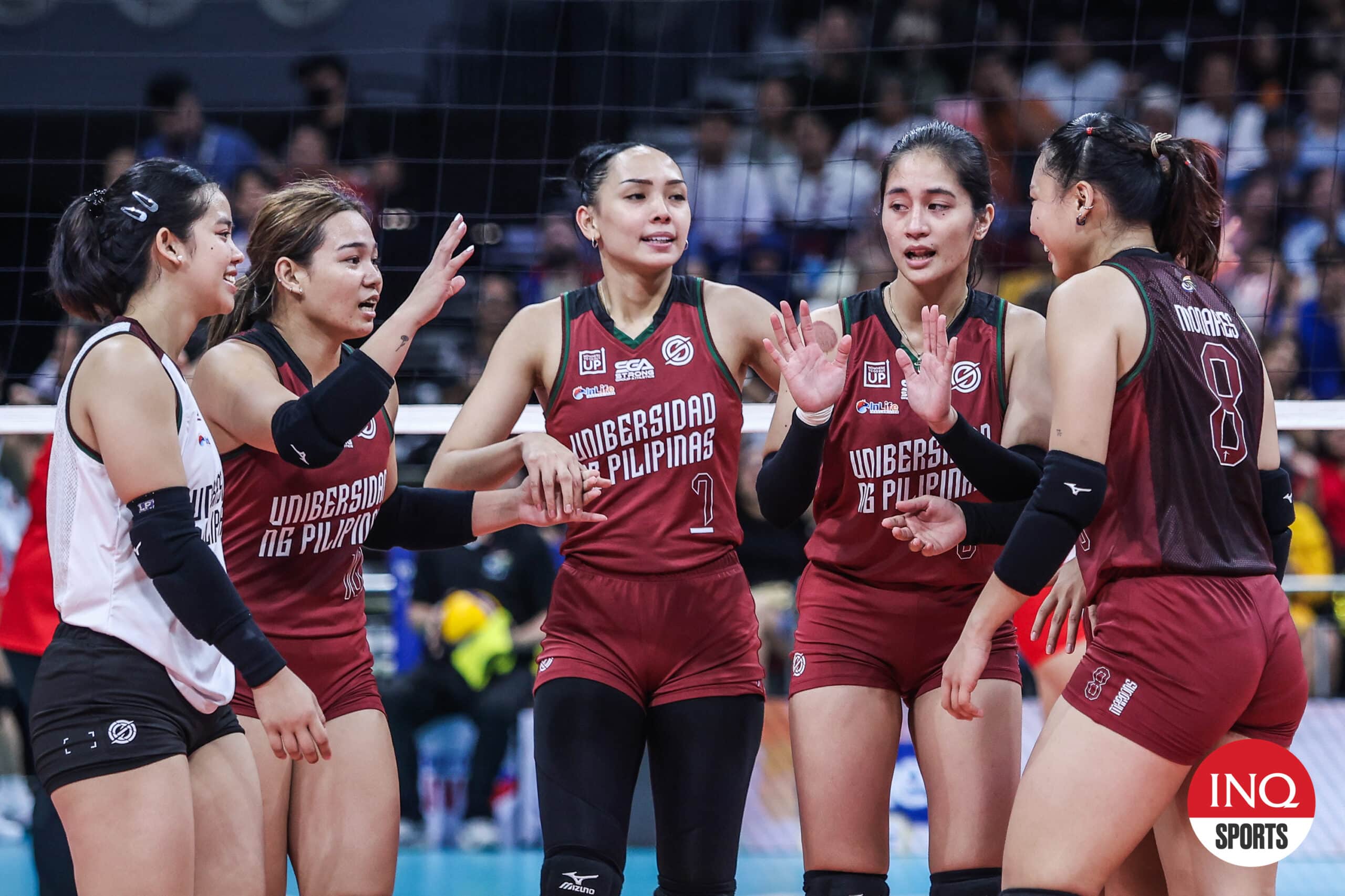 UP Fighting Maroons during a game against UE Lady Warriors in UAAP Season 87 women's volleyball.