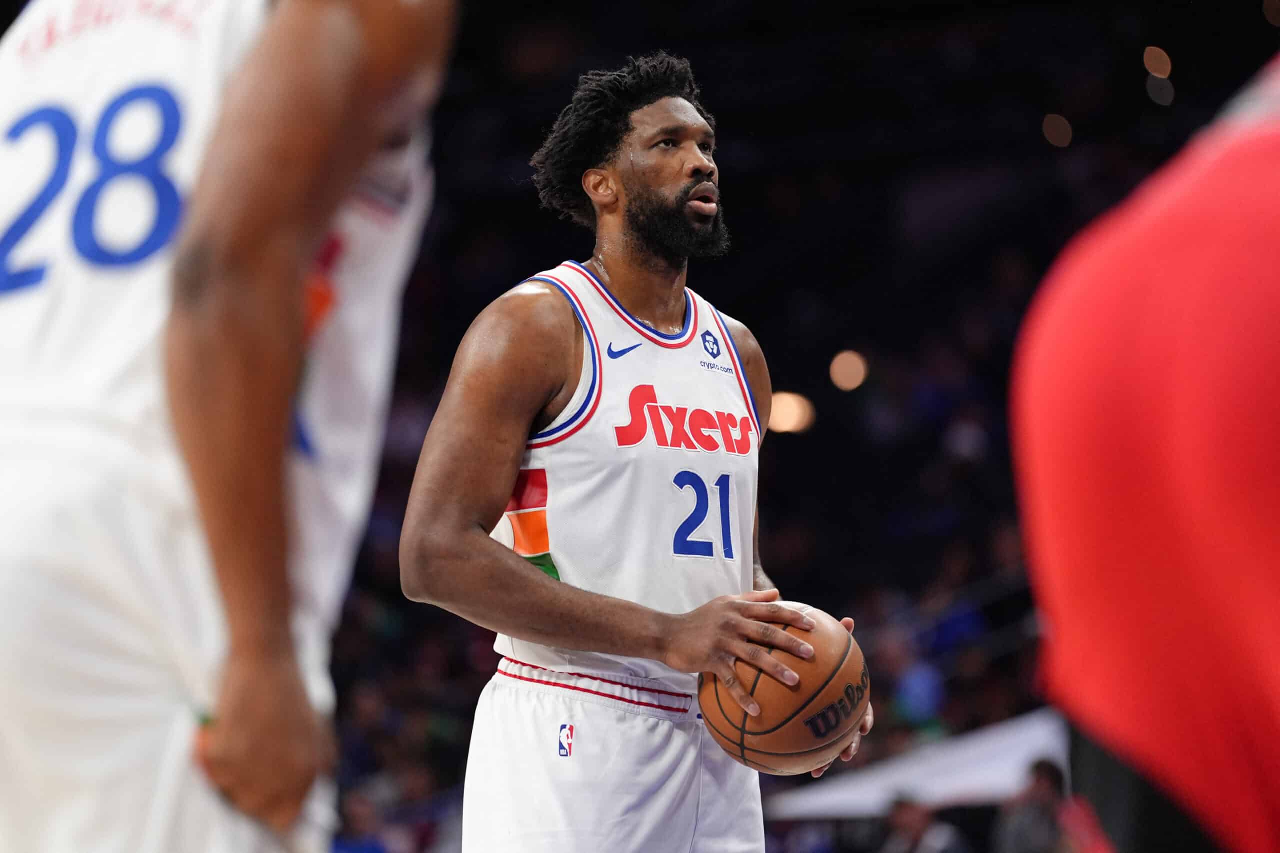 Feb 11, 2025; Philadelphia, Pennsylvania, USA; Philadelphia 76ers center Joel Embiid (21) prepares to shoot a free throw against the Toronto Raptors in the second quarter at Wells Fargo Center. NBA