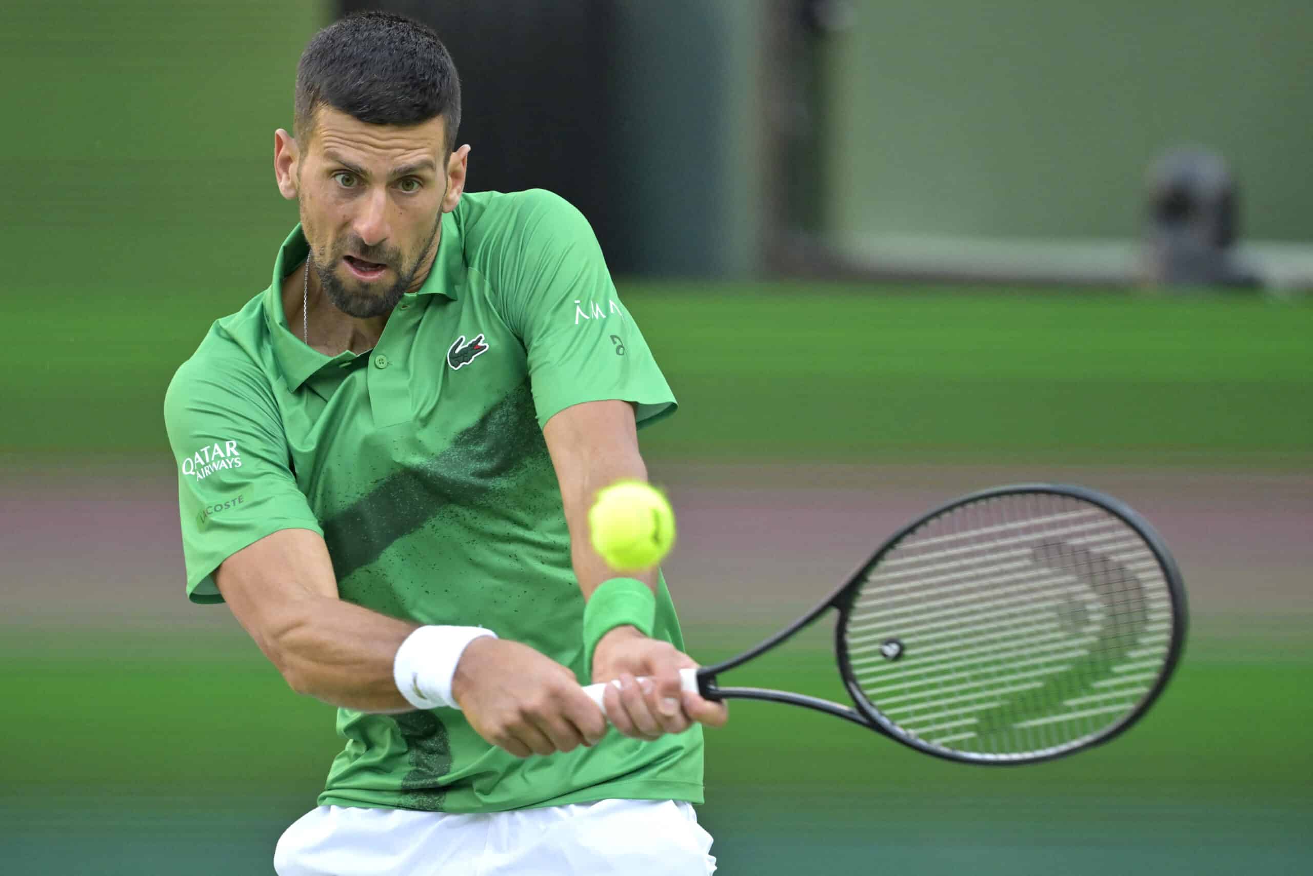 Mar 8, 2025; Indian Wells, CA, USA;  Novak Djokovic (SRB) hits a shot against Botic Van De Zandschulp (not pictured) during the second round of the BNP Paribas Open at the Indian Well Tennis Garden.