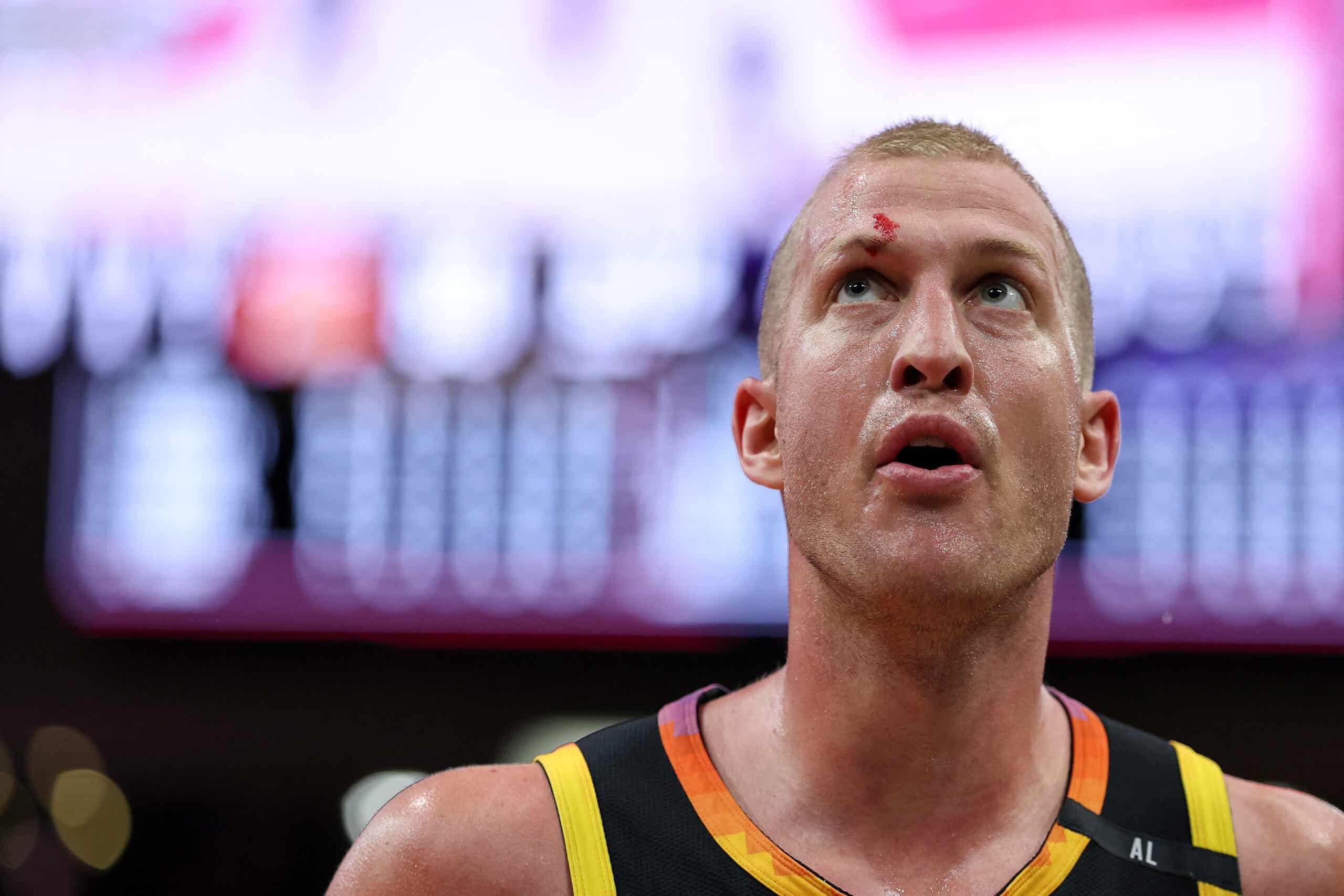 NBA Mason Plumlee #22 of the Phoenix Suns walks off the court after engaging in a scuffle with Steven Adams #12 of the Houston Rockets during the second quarter at Toyota Center on March 12, 2025 in Houston, Texas.