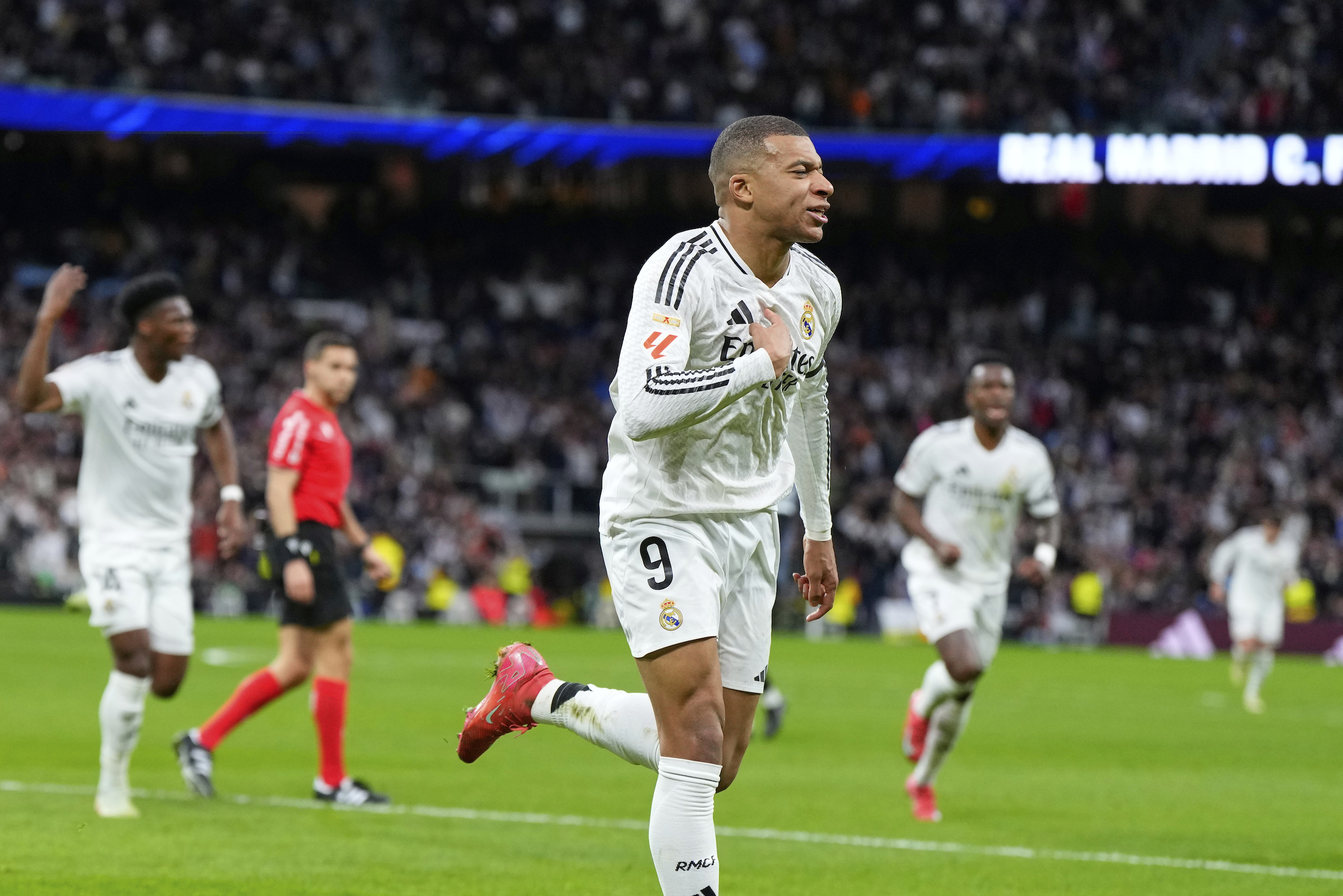 Mbappe, Vinicius score as Real Madrid joins Barcelona on top