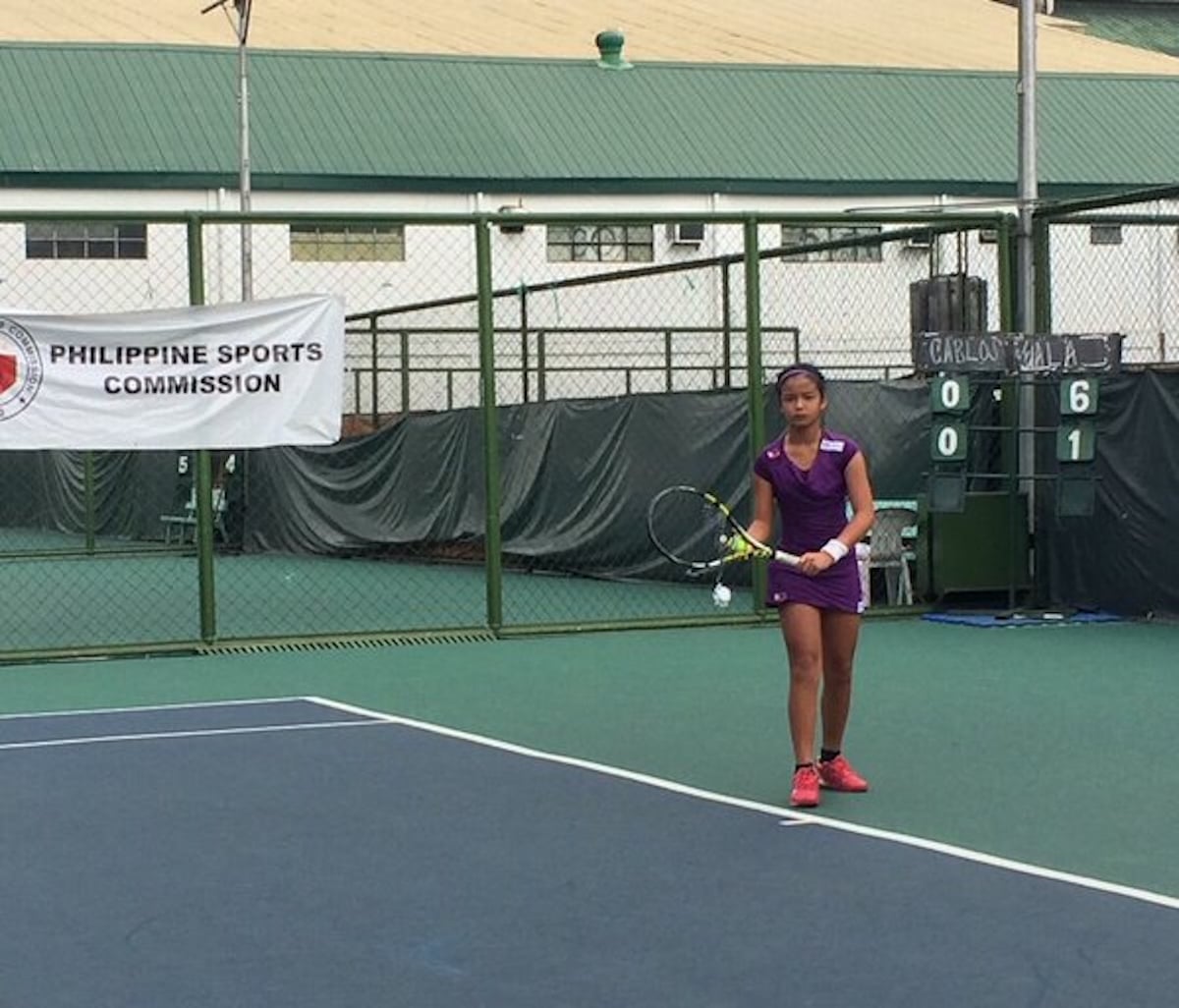 TEN-YEAR old Alex Eala prepares to serve in girls 16-under match of Andrada Cup at RMTC.