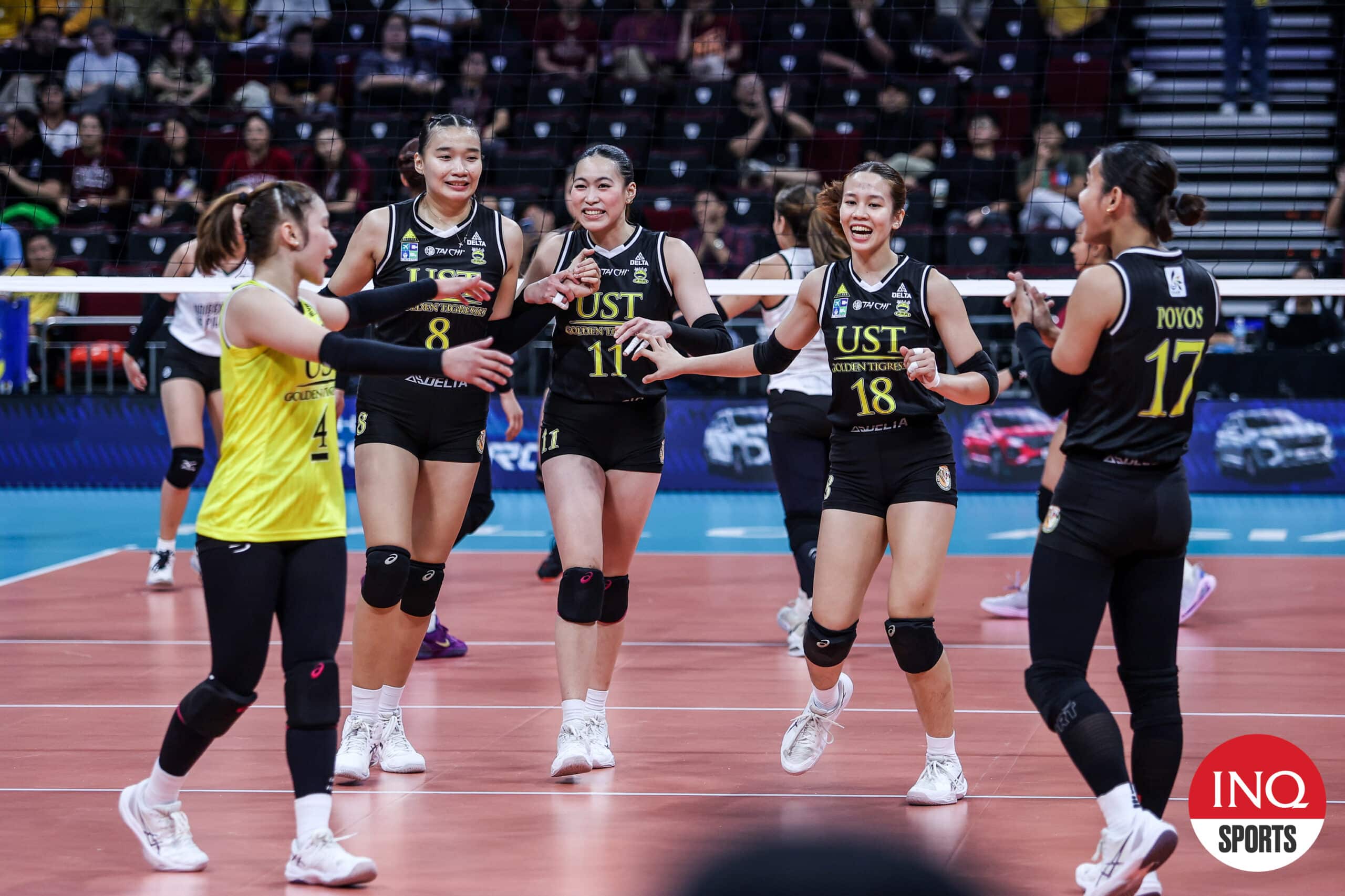 UST Golden Tigresses in the UAAP Season 87 women's volleyball tournament against UP Fighting Maroons.
