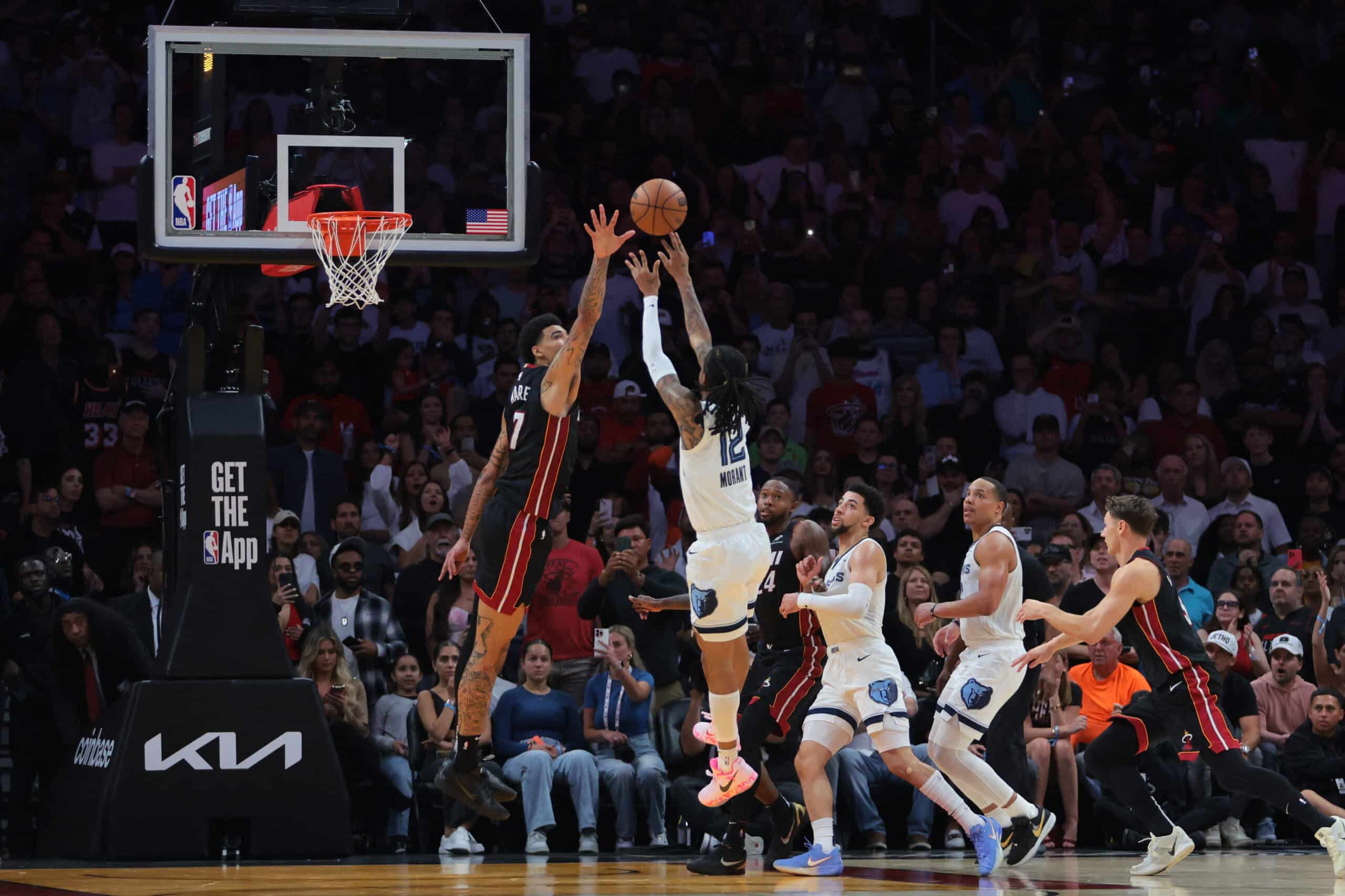 Ja Morant hit a step-back jumper in the lane over 7-footer Kel'el Ware at the buzzer to lift the visiting Memphis Grizzlies over the Miami Heat 110-108 in the NBA  on Thursday night.