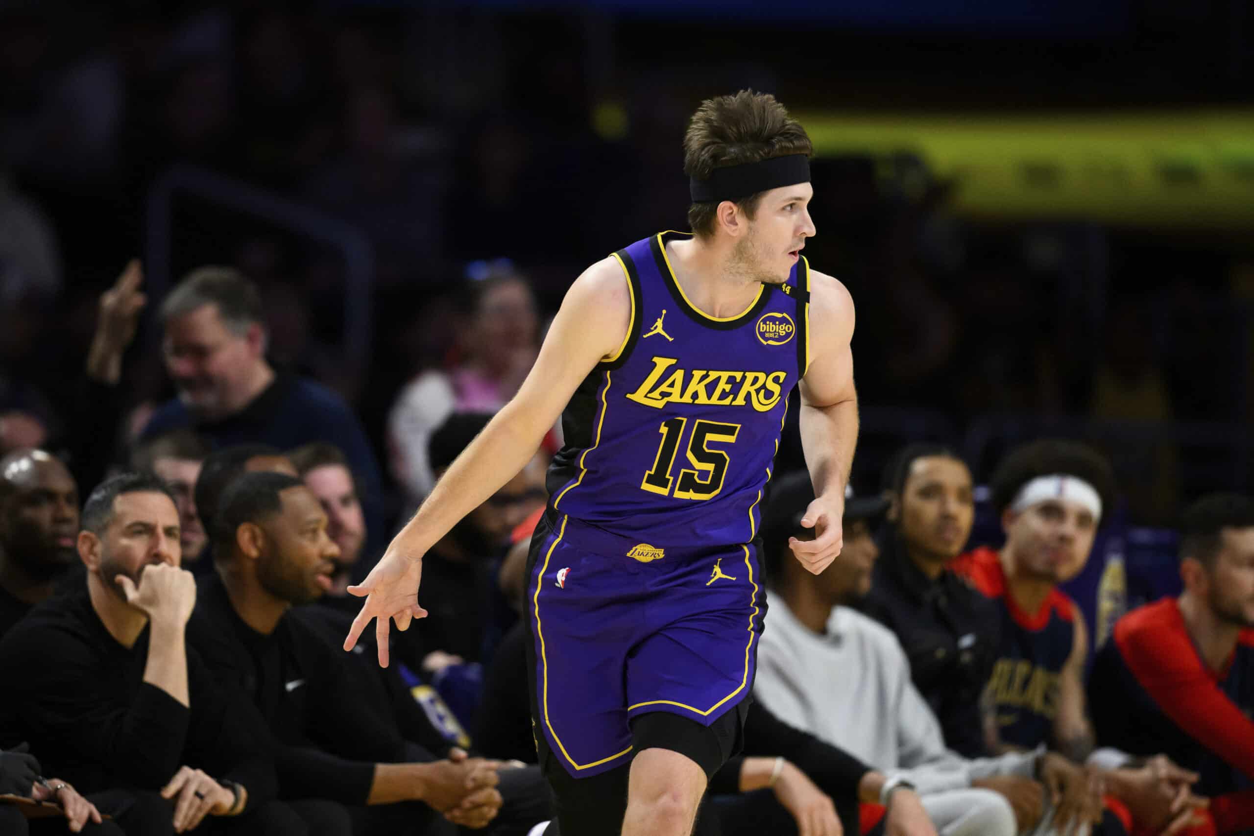Los Angeles Lakers guard Austin Reaves reacts after making a 3-point basket during the first half of an NBA basketball game against the New Orleans Pelicans, Friday, April 4, 2025,