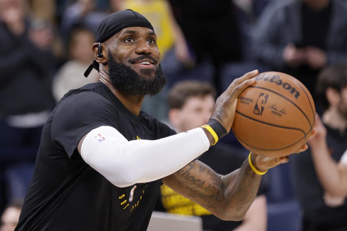 Los Angeles Lakers forward LeBron James warms up before an NBA basketball game against the Oklahoma City Thunder, Sunday, April 6, 2025, in Oklahoma City