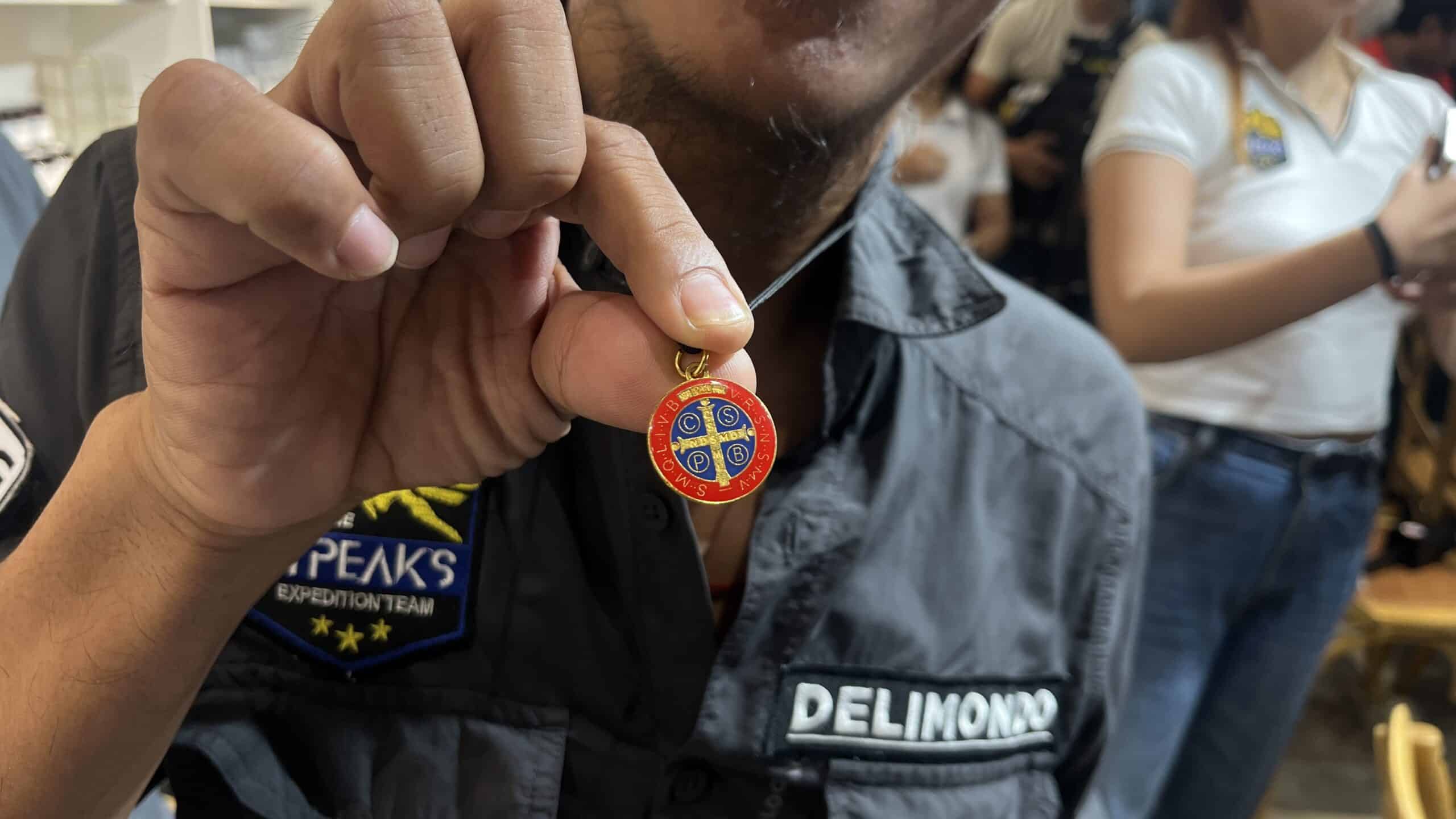 Miguel Mapalad's Saint Benedict medallion for faith and protection given by his son Kidlat. 