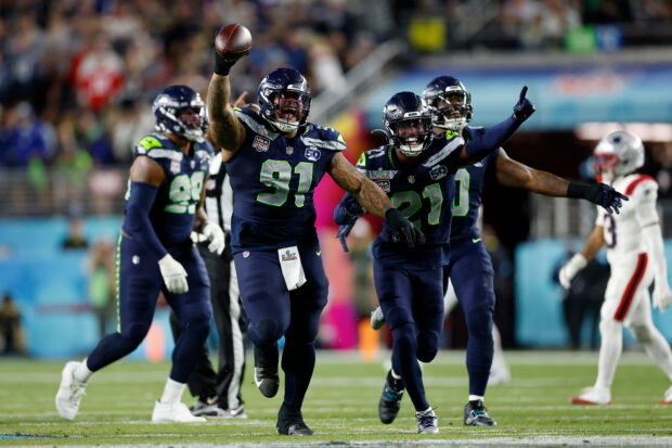 Super Bowl: Seahawks ride 'Dark Side' defense to title, pound Patriots