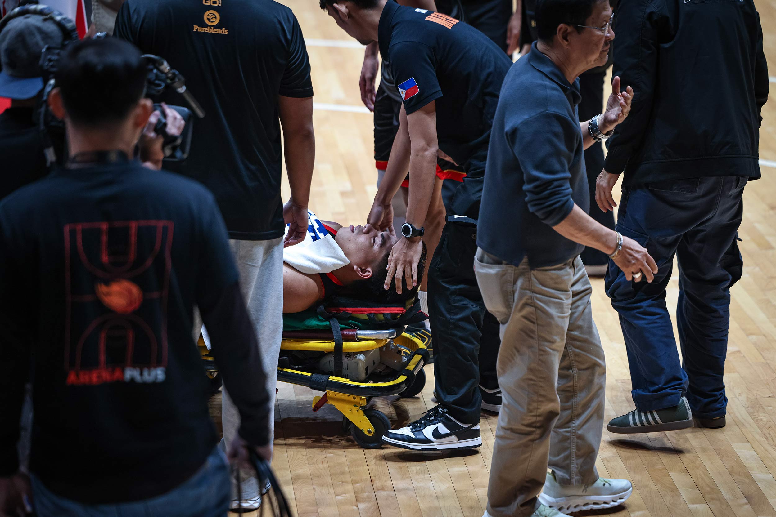 Titan Ultra rookie Bryan Sajonia stretchered off after suffering an injury during a game vs San Miguel Beermen in the 2026 PBA Governors' Cup