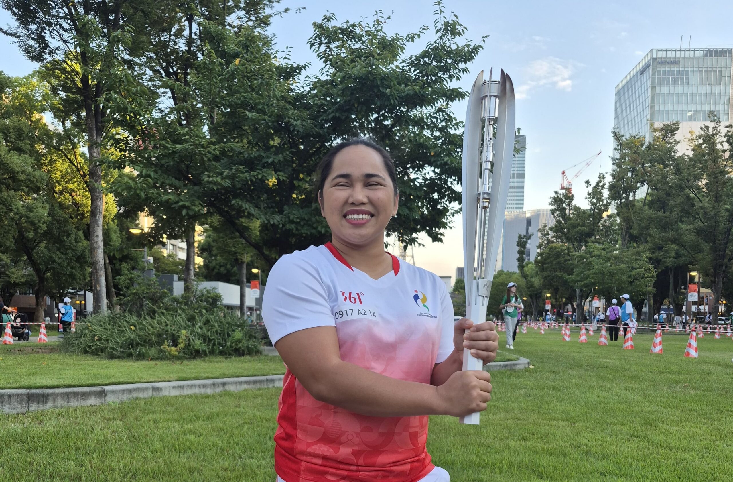 Asian Games: Hidilyn Diaz carries torch, urges PH to ‘keep fire burning’