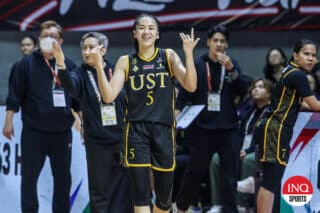 Kent Pastrana and the UST Tigressses during Game 1 of the UAAP Season 87 women's basketball Final