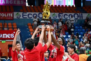 UE Junior Warriors celebrate winning the UAAP Season 87 junior high school boys basketball championship.